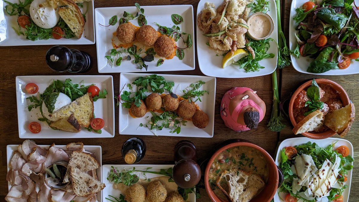 A table of Salento dishes to share at La Pizzica